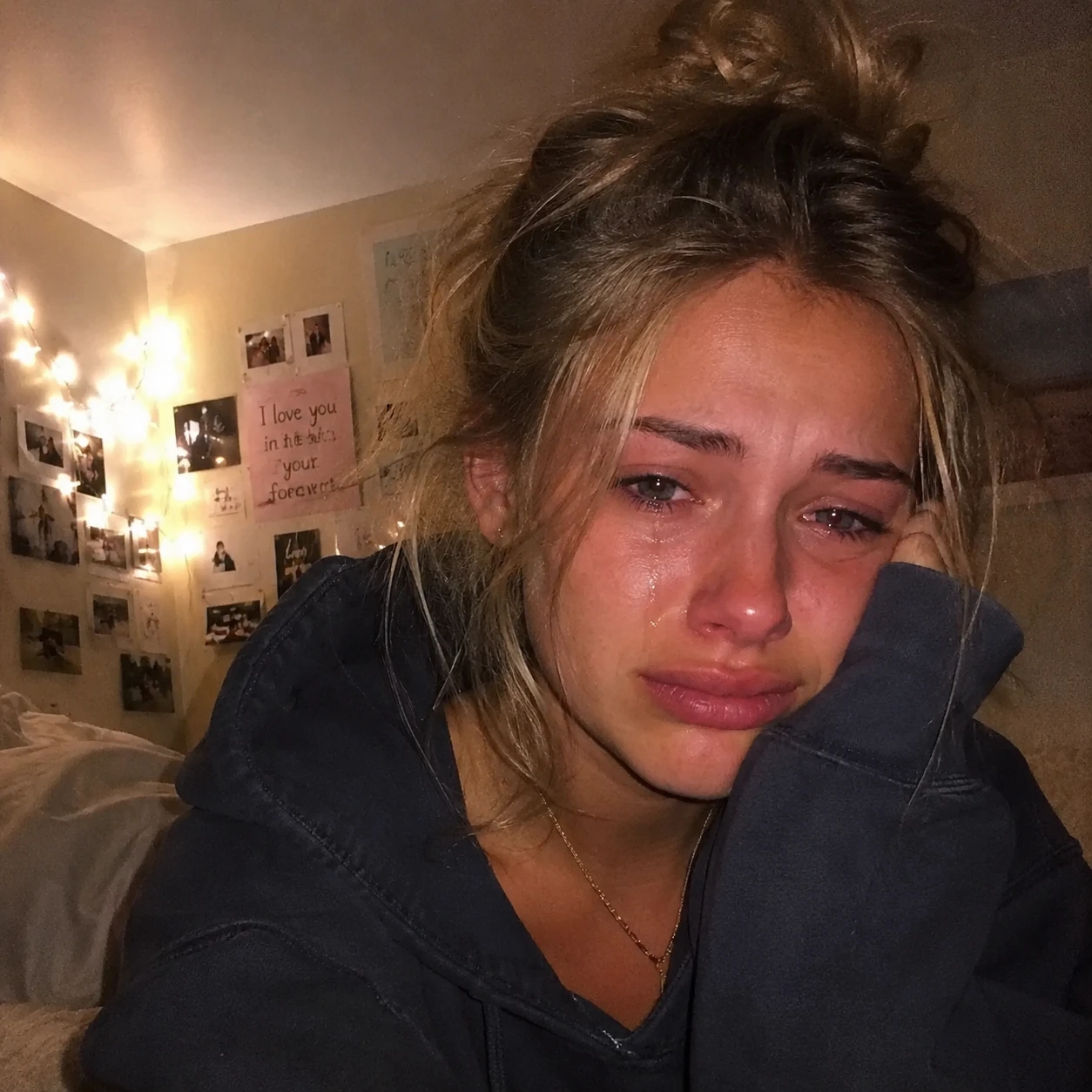 an absolutely devastated Maddie, teared up in her room